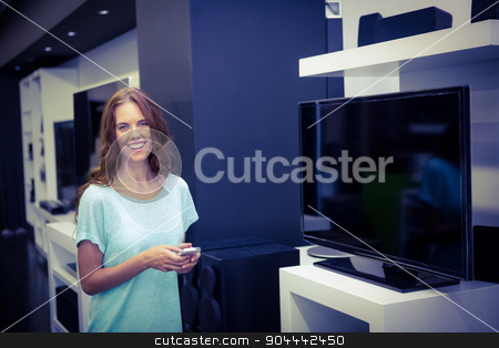 To use this stock image in your creative project, please select the size you need over to the right and click the "Add to Cart" button.
Your downloaded image will come with the Cutcaster watermark removed so don’t worry about the watermark you see on this page. Pretty woman shopping for new television stock photo, Pretty woman shopping for new television at the electronics store by Wavebreak Media