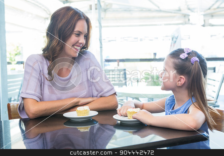To use this stock image in your creative project, please select the size you need over to the right and click the "Add to Cart" button.
Your downloaded image will come with the Cutcaster watermark removed so don’t worry about the watermark you see on this page. Mother and daughter enjoying cakes stock photo, Mother and daughter enjoying cakes at cafe terrace on a sunny day by Wavebreak Media