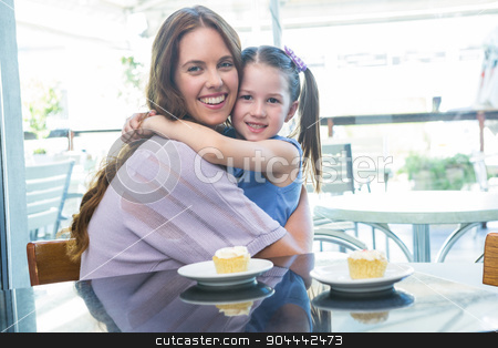 To use this stock image in your creative project, please select the size you need over to the right and click the "Add to Cart" button.
Your downloaded image will come with the Cutcaster watermark removed so don’t worry about the watermark you see on this page. Mother and daughter enjoying cakes at cafe terrace stock photo, Mother and daughter enjoying cakes at cafe terrace on a sunny day by Wavebreak Media