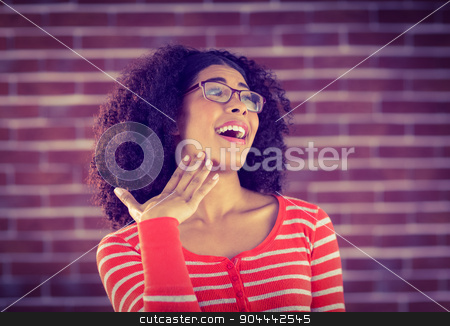 To use this stock image in your creative project, please select the size you need over to the right and click the "Add to Cart" button.
Your downloaded image will come with the Cutcaster watermark removed so don’t worry about the watermark you see on this page. Surprised attractive young woman stock photo, Surprised attractive young woman against red brick background by Wavebreak Media