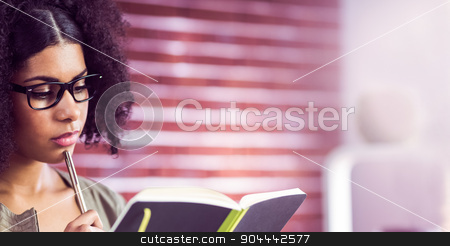 To use this stock image in your creative project, please select the size you need over to the right and click the "Add to Cart" button.
Your downloaded image will come with the Cutcaster watermark removed so don’t worry about the watermark you see on this page. Casual businesswoman looking in her diary stock photo, Casual businesswoman looking in her diary in her office by Wavebreak Media