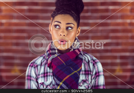 To use this stock image in your creative project, please select the size you need over to the right and click the "Add to Cart" button.
Your downloaded image will come with the Cutcaster watermark removed so don’t worry about the watermark you see on this page. A beautiful happy hipster whistling stock photo, A beautiful happy hipster whistling against a red brick wall by Wavebreak Media