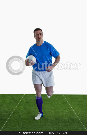 To use this stock image in your creative project, please select the size you need over to the right and click the "Add to Cart" button.
Your downloaded image will come with the Cutcaster watermark removed so don’t worry about the watermark you see on this page. Rugby player running with the rugby ball stock photo, Portrait of a rugby player running with the rugby ball by Wavebreak Media