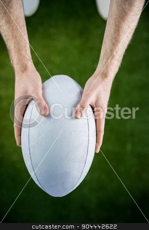 To use this stock image in your creative project, please select the size you need over to the right and click the "Add to Cart" button.
Your downloaded image will come with the Cutcaster watermark removed so don’t worry about the watermark you see on this page. Rugby player catching a rugby ball stock photo, Upward view of a rugby player catching a rugby ball by Wavebreak Media