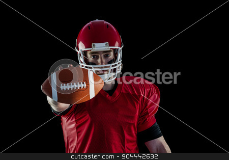 To use this stock image in your creative project, please select the size you need over to the right and click the "Add to Cart" button.
Your downloaded image will come with the Cutcaster watermark removed so don’t worry about the watermark you see on this page. Portrait of american football player showing football to camera stock photo, Portrait of american football player showing football to camera against black background by Wavebreak Media