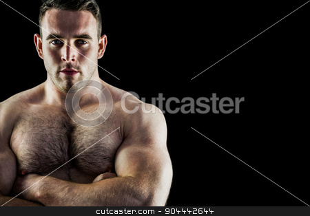 To use this stock image in your creative project, please select the size you need over to the right and click the "Add to Cart" button.
Your downloaded image will come with the Cutcaster watermark removed so don’t worry about the watermark you see on this page. Handsome bodybuilder with arms crossed stock photo, Handsome bodybuilder with arms crossed on black background by Wavebreak Media