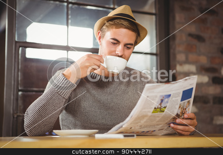 To use this stock image in your creative project, please select the size you need over to the right and click the "Add to Cart" button.
Your downloaded image will come with the Cutcaster watermark removed so don’t worry about the watermark you see on this page. Handsome hipster drinking coffee and reading newspaper stock photo, Handsome hipster drinking coffee and reading newspaper at coffee shop by Wavebreak Media