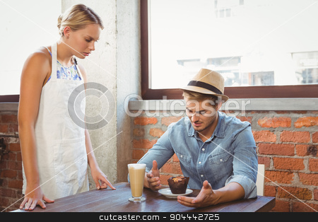 To use this stock image in your creative project, please select the size you need over to the right and click the "Add to Cart" button.
Your downloaded image will come with the Cutcaster watermark removed so don’t worry about the watermark you see on this page. Handsome hipster complaining to blonde waitress stock photo, Handsome hipster complaining to blonde waitress at coffee shop by Wavebreak Media