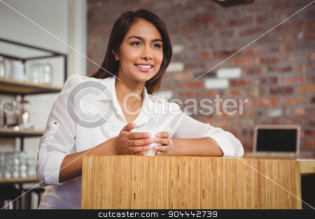 To use this stock image in your creative project, please select the size you need over to the right and click the "Add to Cart" button.
Your downloaded image will come with the Cutcaster watermark removed so don’t worry about the watermark you see on this page. Pretty brunette having cup of coffee stock photo, Pretty brunette having cup of coffee at the cafe by Wavebreak Media