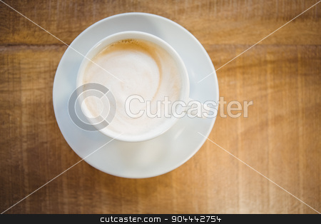 To use this stock image in your creative project, please select the size you need over to the right and click the "Add to Cart" button.
Your downloaded image will come with the Cutcaster watermark removed so don’t worry about the watermark you see on this page. Close up of cup of coffee stock photo, Close up of cup of coffee on table by Wavebreak Media