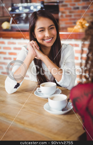 To use this stock image in your creative project, please select the size you need over to the right and click the "Add to Cart" button.
Your downloaded image will come with the Cutcaster watermark removed so don’t worry about the watermark you see on this page. Female friends having coffee stock photo, Two smiling friends having coffee at coffee shop by Wavebreak Media