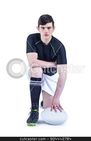 To use this stock image in your creative project, please select the size you need over to the right and click the "Add to Cart" button.
Your downloaded image will come with the Cutcaster watermark removed so don’t worry about the watermark you see on this page. Kneeling rugby player holding a rugby ball stock photo, Portrait of a kneeling rugby player holding a ball on a white background by Wavebreak Media