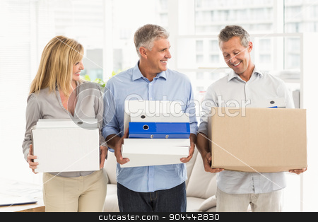 To use this stock image in your creative project, please select the size you need over to the right and click the "Add to Cart" button.
Your downloaded image will come with the Cutcaster watermark removed so don’t worry about the watermark you see on this page. Casual business people talking and carrying cartons stock photo, Casual business people talking and carrying cartons in the office by Wavebreak Media
