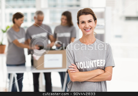 To use this stock image in your creative project, please select the size you need over to the right and click the "Add to Cart" button.
Your downloaded image will come with the Cutcaster watermark removed so don’t worry about the watermark you see on this page. Smiling female volunteer with arms crossed stock photo, Portrait of smiling female volunteer with arms crossed in the office by Wavebreak Media
