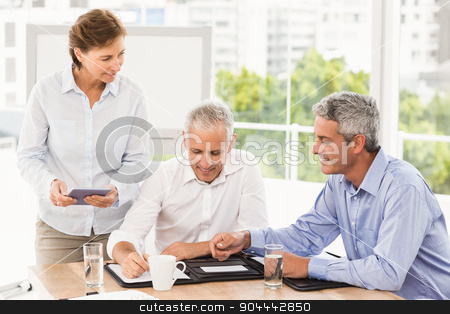 To use this stock image in your creative project, please select the size you need over to the right and click the "Add to Cart" button.
Your downloaded image will come with the Cutcaster watermark removed so don’t worry about the watermark you see on this page. Smiling business people making an arrangement stock photo, Smiling business people making an arrangement in the office by Wavebreak Media