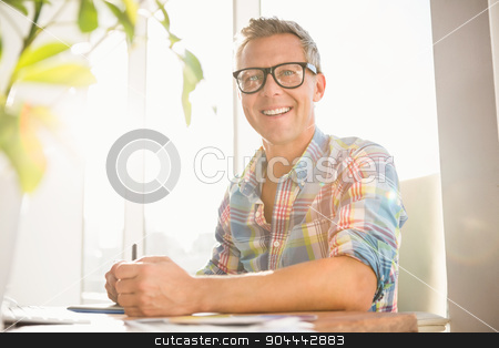 To use this stock image in your creative project, please select the size you need over to the right and click the "Add to Cart" button.
Your downloaded image will come with the Cutcaster watermark removed so don’t worry about the watermark you see on this page. Smiling casual designer working with digitizer stock photo, Portrait of smiling casual designer working with digitizer in the office by Wavebreak Media