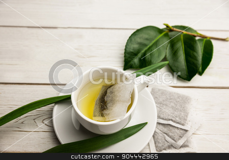 To use this stock image in your creative project, please select the size you need over to the right and click the "Add to Cart" button.
Your downloaded image will come with the Cutcaster watermark removed so don’t worry about the watermark you see on this page. Cup of herbal tea on table stock photo, Cup of herbal tea on table shot in studio by Wavebreak Media