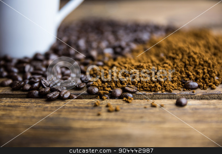 To use this stock image in your creative project, please select the size you need over to the right and click the "Add to Cart" button.
Your downloaded image will come with the Cutcaster watermark removed so don’t worry about the watermark you see on this page. Coffee beans on a table with cup stock photo, Coffee beans on a table with cup shot in studio by Wavebreak Media