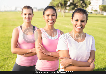 To use this stock image in your creative project, please select the size you need over to the right and click the "Add to Cart" button.
Your downloaded image will come with the Cutcaster watermark removed so don’t worry about the watermark you see on this page. Three smiling women wearing pink for breast cancer stock photo, Portrait of three smiling women wearing pink for breast cancer in parkland by Wavebreak Media