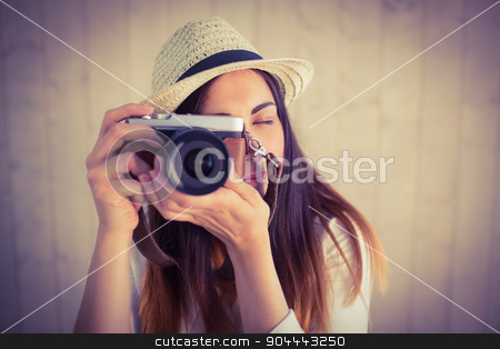To use this stock image in your creative project, please select the size you need over to the right and click the "Add to Cart" button.
Your downloaded image will come with the Cutcaster watermark removed so don’t worry about the watermark you see on this page. Pretty hipster using her vintage camera stock photo, Pretty hipster using her vintage camera on wooden planks background by Wavebreak Media