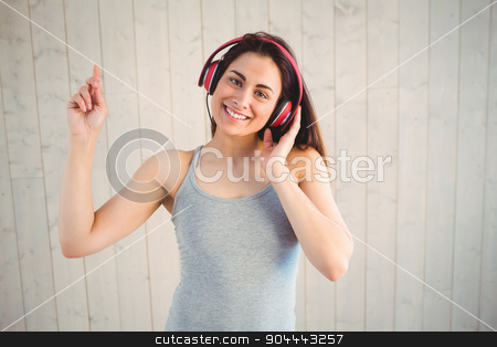 To use this stock image in your creative project, please select the size you need over to the right and click the "Add to Cart" button.
Your downloaded image will come with the Cutcaster watermark removed so don’t worry about the watermark you see on this page. Pretty hipster listening to music stock photo, Pretty hipster listening to music on wooden planks background by Wavebreak Media