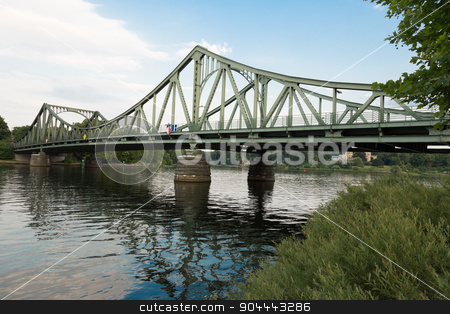 To use this stock image in your creative project, please select the size you need over to the right and click the "Add to Cart" button.
Your downloaded image will come with the Cutcaster watermark removed so don’t worry about the watermark you see on this page. Glienicke Bridge west side stock photo, West side of the Glienicke Bridge in Berlin by Bernd Kröger