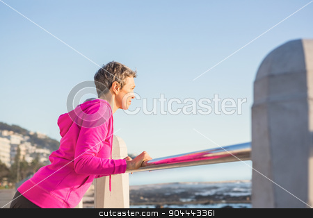 To use this stock image in your creative project, please select the size you need over to the right and click the "Add to Cart" button.
Your downloaded image will come with the Cutcaster watermark removed so don’t worry about the watermark you see on this page. Sporty woman stretching on railing stock photo, Sporty woman stretching on railing at promenade by Wavebreak Media