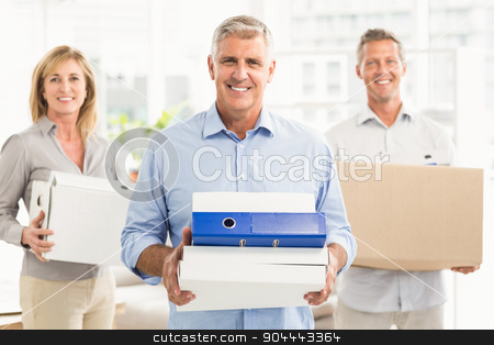 To use this stock image in your creative project, please select the size you need over to the right and click the "Add to Cart" button.
Your downloaded image will come with the Cutcaster watermark removed so don’t worry about the watermark you see on this page. Casual business people carrying cartons stock photo, Portrait of casual business people carrying cartons in the office by Wavebreak Media