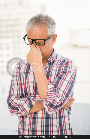 To use this stock image in your creative project, please select the size you need over to the right and click the "Add to Cart" button.
Your downloaded image will come with the Cutcaster watermark removed so don’t worry about the watermark you see on this page. Troubled casual businessman stock photo, Troubled casual businessman in the office by Wavebreak Media