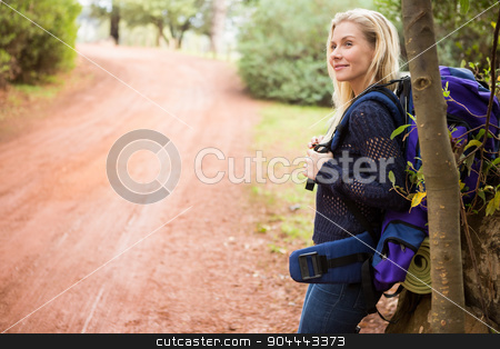 To use this stock image in your creative project, please select the size you need over to the right and click the "Add to Cart" button.
Your downloaded image will come with the Cutcaster watermark removed so don’t worry about the watermark you see on this page. Smiling female hiker waiting by the side of the road stock photo, Side view of a female hiker waiting by the side of the road by Wavebreak Media