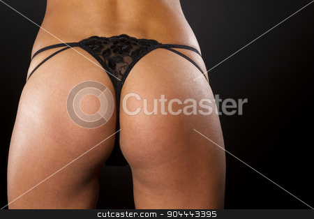 To use this stock image in your creative project, please select the size you need over to the right and click the "Add to Cart" button.
Your downloaded image will come with the Cutcaster watermark removed so don’t worry about the watermark you see on this page. Black Thong Panties stock photo, Portrait of a model with a black thong in a studio environment by Walter Arce