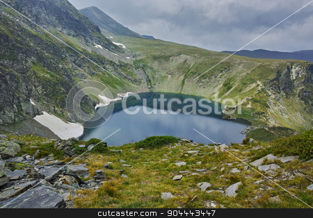 To use this stock image in your creative project, please select the size you need over to the right and click the "Add to Cart" button.
Your downloaded image will come with the Cutcaster watermark removed so don’t worry about the watermark you see on this page. The Eye lake before storm stock photo, The Eye lake before storm, The Seven Rila Lakes, Bulgaria by Stoyan Haytov