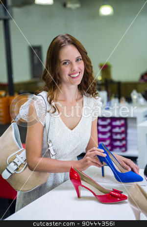 To use this stock image in your creative project, please select the size you need over to the right and click the "Add to Cart" button.
Your downloaded image will come with the Cutcaster watermark removed so don’t worry about the watermark you see on this page. Pretty woman shopping for shoes stock photo, Pretty woman shopping for shoes at the shopping mall by Wavebreak Media