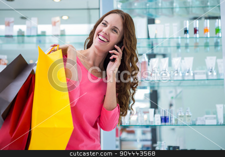 To use this stock image in your creative project, please select the size you need over to the right and click the "Add to Cart" button.
Your downloaded image will come with the Cutcaster watermark removed so don’t worry about the watermark you see on this page. Pretty woman talking on phone while shopping stock photo, Pretty woman talking on phone while shopping at the pharmacy by Wavebreak Media
