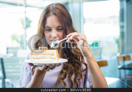 To use this stock image in your creative project, please select the size you need over to the right and click the "Add to Cart" button.
Your downloaded image will come with the Cutcaster watermark removed so don’t worry about the watermark you see on this page. Pretty brunette enjoying a cake stock photo, Pretty brunette enjoying a cake in a coffee shop by Wavebreak Media
