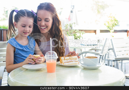 To use this stock image in your creative project, please select the size you need over to the right and click the "Add to Cart" button.
Your downloaded image will come with the Cutcaster watermark removed so don’t worry about the watermark you see on this page. Mother and daughter at cafe terrace stock photo, Mother and daughter at cafe terrace on a sunny day by Wavebreak Media