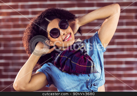 To use this stock image in your creative project, please select the size you need over to the right and click the "Add to Cart" button.
Your downloaded image will come with the Cutcaster watermark removed so don’t worry about the watermark you see on this page. Attractive young woman feeling good stock photo, Portrait of attractive young woman feeling good against red brick background by Wavebreak Media