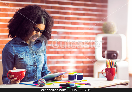 To use this stock image in your creative project, please select the size you need over to the right and click the "Add to Cart" button.
Your downloaded image will come with the Cutcaster watermark removed so don’t worry about the watermark you see on this page. Casual businesswoman on a coffee break stock photo, Casual businesswoman on a coffee break in her office by Wavebreak Media