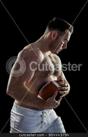 To use this stock image in your creative project, please select the size you need over to the right and click the "Add to Cart" button.
Your downloaded image will come with the Cutcaster watermark removed so don’t worry about the watermark you see on this page. Shirtless American football player with ball stock photo, Shirtless American football player with ball on black background by Wavebreak Media