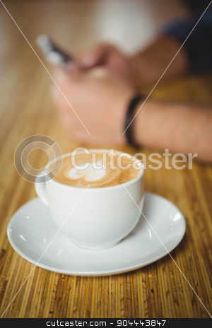 To use this stock image in your creative project, please select the size you need over to the right and click the "Add to Cart" button.
Your downloaded image will come with the Cutcaster watermark removed so don’t worry about the watermark you see on this page. High angle close-up of coffee stock photo, High angle close-up of coffee over wooden background by Wavebreak Media