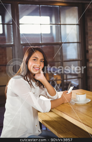 To use this stock image in your creative project, please select the size you need over to the right and click the "Add to Cart" button.
Your downloaded image will come with the Cutcaster watermark removed so don’t worry about the watermark you see on this page. Portrait of a beautiful businesswoman using a smartphone stock photo, Portrait of a beautiful businesswoman using a smartphone in a cafe by Wavebreak Media