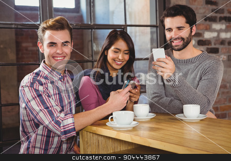 To use this stock image in your creative project, please select the size you need over to the right and click the "Add to Cart" button.
Your downloaded image will come with the Cutcaster watermark removed so don’t worry about the watermark you see on this page. Group of friends looking at their smartphone stock photo, Group of friends looking at their smartphone in a cafe by Wavebreak Media