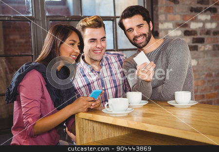 To use this stock image in your creative project, please select the size you need over to the right and click the "Add to Cart" button.
Your downloaded image will come with the Cutcaster watermark removed so don’t worry about the watermark you see on this page. Group of friends looking at a smartphone stock photo, Group of friends looking at a smartphone in a cafe by Wavebreak Media