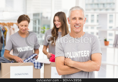To use this stock image in your creative project, please select the size you need over to the right and click the "Add to Cart" button.
Your downloaded image will come with the Cutcaster watermark removed so don’t worry about the watermark you see on this page. Smiling volunteer with arms crossed stock photo, Portrait of smiling volunteer with arms crossed in the office by Wavebreak Media