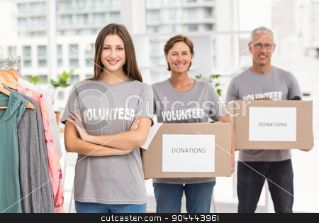 To use this stock image in your creative project, please select the size you need over to the right and click the "Add to Cart" button.
Your downloaded image will come with the Cutcaster watermark removed so don’t worry about the watermark you see on this page. Smiling volunteers holding donation boxes stock photo, Portrait of smiling volunteers holding donation boxes in the office by Wavebreak Media