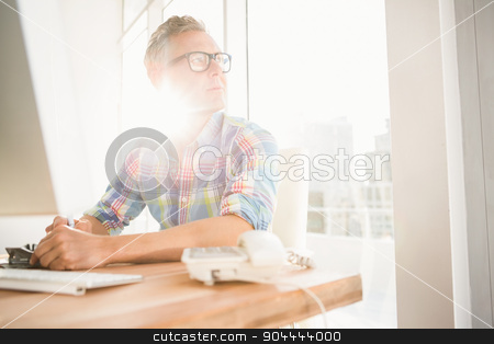 To use this stock image in your creative project, please select the size you need over to the right and click the "Add to Cart" button.
Your downloaded image will come with the Cutcaster watermark removed so don’t worry about the watermark you see on this page. Casual designer sitting and daydreaming at his desk stock photo, Casual designer sitting and daydreaming at his desk in the office by Wavebreak Media
