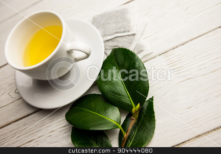 To use this stock image in your creative project, please select the size you need over to the right and click the "Add to Cart" button.
Your downloaded image will come with the Cutcaster watermark removed so don’t worry about the watermark you see on this page. Cup of herbal tea on table stock photo, Cup of herbal tea on table shot in studio by Wavebreak Media