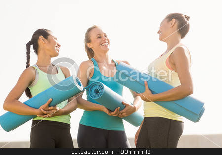 To use this stock image in your creative project, please select the size you need over to the right and click the "Add to Cart" button.
Your downloaded image will come with the Cutcaster watermark removed so don’t worry about the watermark you see on this page. Laughing sporty women with exercise mats stock photo, Laughing sporty women with exercise mats in parkland by Wavebreak Media
