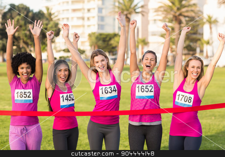 To use this stock image in your creative project, please select the size you need over to the right and click the "Add to Cart" button.
Your downloaded image will come with the Cutcaster watermark removed so don’t worry about the watermark you see on this page. Cheering women supporting breast cancer marathon stock photo, Portrait of cheering women supporting breast cancer marathon in parkland by Wavebreak Media