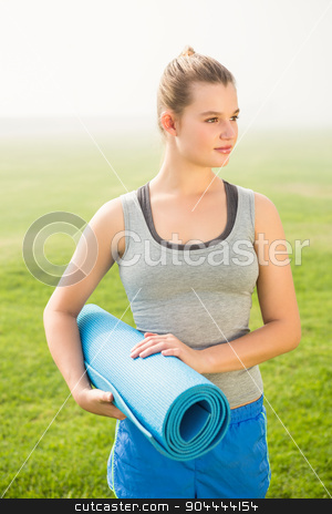 To use this stock image in your creative project, please select the size you need over to the right and click the "Add to Cart" button.
Your downloaded image will come with the Cutcaster watermark removed so don’t worry about the watermark you see on this page. Sporty blonde holding exercise mat stock photo, Sporty blonde holding exercise mat in parkland by Wavebreak Media